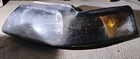 1999-2004 Ford Mustang Left Driver Head Light Oem XR33-13006-A Used. Price: $52.80.