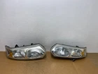 2003 To 2007 Saturn Ion Halogen Headlights Left+right Side AE0312 Dw Used. Price: $84.99.