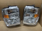 Oem 2008-2026 Ford E-series Halogen Headlight Set- AC24-13006 / AC24-13005 Used. Price: $244.31.