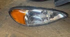99-05 Pontiac Grand Front Right Passenger Side Headlight Lamp Oem, 114-02683R Used. Price: $40.00.