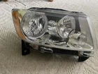 Eagle Eyes CS339-B001R Headlight Passenger Right 2011-13 Jeep Grand Cherokee Used. Price: $75.00.