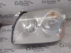 Driver Left Headlight Bright Background Fits 05-07 Magnum 313862 Used. Price: $68.00.