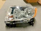2011-2014 Jeep Compass Driver Left Oem Head Light 68088869AA Used. Price: $65.00.