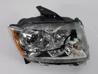 Genuine Mopar Headlamp Right 68639201AA New. Price: $1137.35.