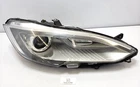 12-16 Oem Tesla Front Right Passenger Side Headlight Lamp Xenon Note* Used. Price: $285.01.