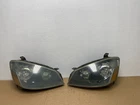 2005 To 2006 Nissan Altima Left+right Side Set Halogen Headlights Oem AB6877 Dw Used. Price: $69.99.