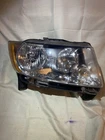 11-13 Jeep Grand Cherokee Eagle Eyes CS339-B001R Headlight Front Right Passanger Used. Price: $109.00.