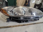Headlight Assembly For Mazda Grand Touring Xenon - Passenger Side MA2519148 New. Price: $340.00.