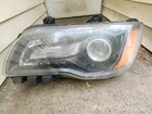 Genuine 2011-2014 Chrysler 300 Driver Side Left Halogen Headlight Assembly Lh Used. Price: $100.00.