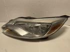 Driver Headlight Halogen Black Trim St Fits 12-14 Focus 554 Used. Price: $138.00.