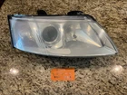 Right Headlight Assembly For 2003-2007 Saab 2006 2005 2004 Tyc 20-6693-00-9 Used. Price: $69.95.