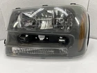 2002-2009 Chevrolet Trailblazer Driver Headlight Notched Full Width Grille Bar Used. Price: $90.00.