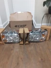 For 2004-2006 Toyota Highlander Headlights Assembly Chrome Housing Left Right 2X New. Price: $104.49.