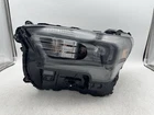 2024 Toyota Tacoma Oem Led Headlight Driver Left Side Used. Price: $250.00.