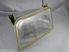 1994 Ford F150 4X4 Oem Left Driver Side Headlight Part # SAE-H-92TK Used. Price: $27.30.