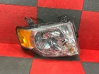 08-12 Ford Escape Passenger Headlight Lamp Clear Background 20-6877-00-9 Used. Price: $85.80.