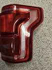 New Ford F-150 Rh Taillight Oem. Repaired. Part # HL34 13404 Cc. Price: $100.00.