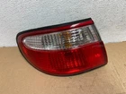 1999 To 2000 Mazda Millenia Left Driver Lh Side Tail Light AD7989 Dg Used. Price: $32.50.