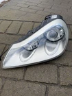 2008-2010 Porsche Cayenne Headlight Right Passenger Side Used. Price: $375.00.