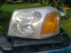 2002 2003 2004 2005-2009 Gmc Envoy Left Driver Side Headlight 40310748-OEM Used. Price: $75.00.