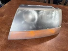 1999 02 2004 Jeep Grand Cherokee Left Hand Lh Drivers Side Headlight Assembly Used. Price: $22.50.
