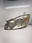 Driver Left Lh Headlight Thru Smoked Lens 2003-2004 Corolla Oem Used. Price: $50.00.