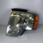 2009-2014 Ford F150 Lh Headlight Assembly Oem Fomoco 9L34-13006-B Used. Price: $68.99.