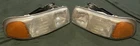 16524544 & 16524543 Left Right Headlamp 1999-2007 Gmc Sierra Yukon Escalade Used. Price: $65.00.