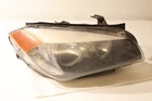 Halogen Base 13 14 Bmw X1 Passenger Right Headlight Lamp 31566 Used. Price: $133.00.