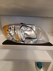 Headlight Lens-assembly Right Dorman 1590313 4857700AB; 20-6021-00; 2221-0043R New. Price: $55.00.