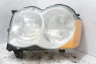 2008-2010 Jeep Grand Cherokee Driver Left Front Head Light 55157483AE Oem Used. Price: $64.67.