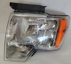 2009-14 Ford F150 Lt Headlight Oem Fomoco 9L34-13006-A Used. Price: $82.50.