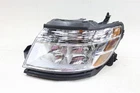 New Oem Ford Driver Side Headlight Assembly 8G1Z-13008-F Taurus 2008-2009. Price: $249.95.