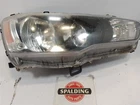 Passenger Right Headlight Halogen From 2010 Mitsubishi Lancer 11014281 Used. Price: $196.94.