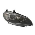 New Aftermarket Passenger Side Hid Headlight Lens Housing 63117287018. Price: $1258.08.
