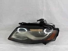 Headlamp Assembly Audi A4 Left 09 10 11 12 Used. Price: $180.00.