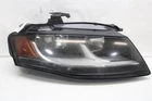 Headlight Lamp Assembly Audi A4 09 10 11 12 Right 1453497 Used. Price: $109.99.