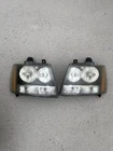 07-14 Oem Chevy Gmc Tahoe Avalanche Left & Right Headlights Lamp Housing Used. Price: $98.98.