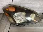 Genuine 2004-2009 Nissan Quest Passenger Right Headlight Lamp Used. Price: $29.95.