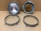 1961-64 Corvair 5.5 Headlight Unit Assembly Back Bracket And 2 Trim Rings 3 Tab Used. Price: $58.49.