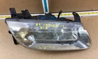 2000-2002 Saturn L-series Right Headlight 114-00588 Oem Used. Price: $54.80.