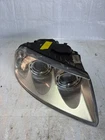 2002-07 Volkswagen Touareg Passenger Side Headlight 7L6941016CL Used. Price: $124.52.