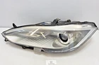 12-16 Oem Tesla Model Front Left Driver Side Headlight Lamp Xenon Note* Used. Price: $180.00.