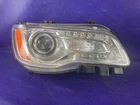 11-14 Chrysler Headlight Front Lamp Right Rh Chrome Bezel 68143002AC Used. Price: $149.99.