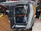 21-23 Ford F-150LH Headlamp Assy ML34-13E017-DA Missing Tab Used. Price: $500.00.