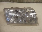 Genuine Ford F8AB-13005-A Passenger Headlight Assemby 03-11 Crown Vic New. Price: $49.99.