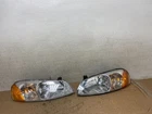 2001 To 2002 Chrysler Sebring Left+right Side Headlights Z1055 Dw Used. Price: $61.09.
