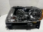 Genuine Mopar 55079379AG Lh Halogen Headlight 11-13 Grand Cherokee Oe New. Price: $178.99.