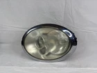 Headlamp Assembly Mini Cooper Left 05 06 07 08 Used. Price: $54.00.