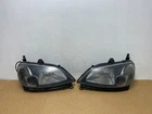 2001 - 2003 Honda Civic Coupe Headlights Halogen Left+right Side AD5290 Dw Used. Price: $149.99.